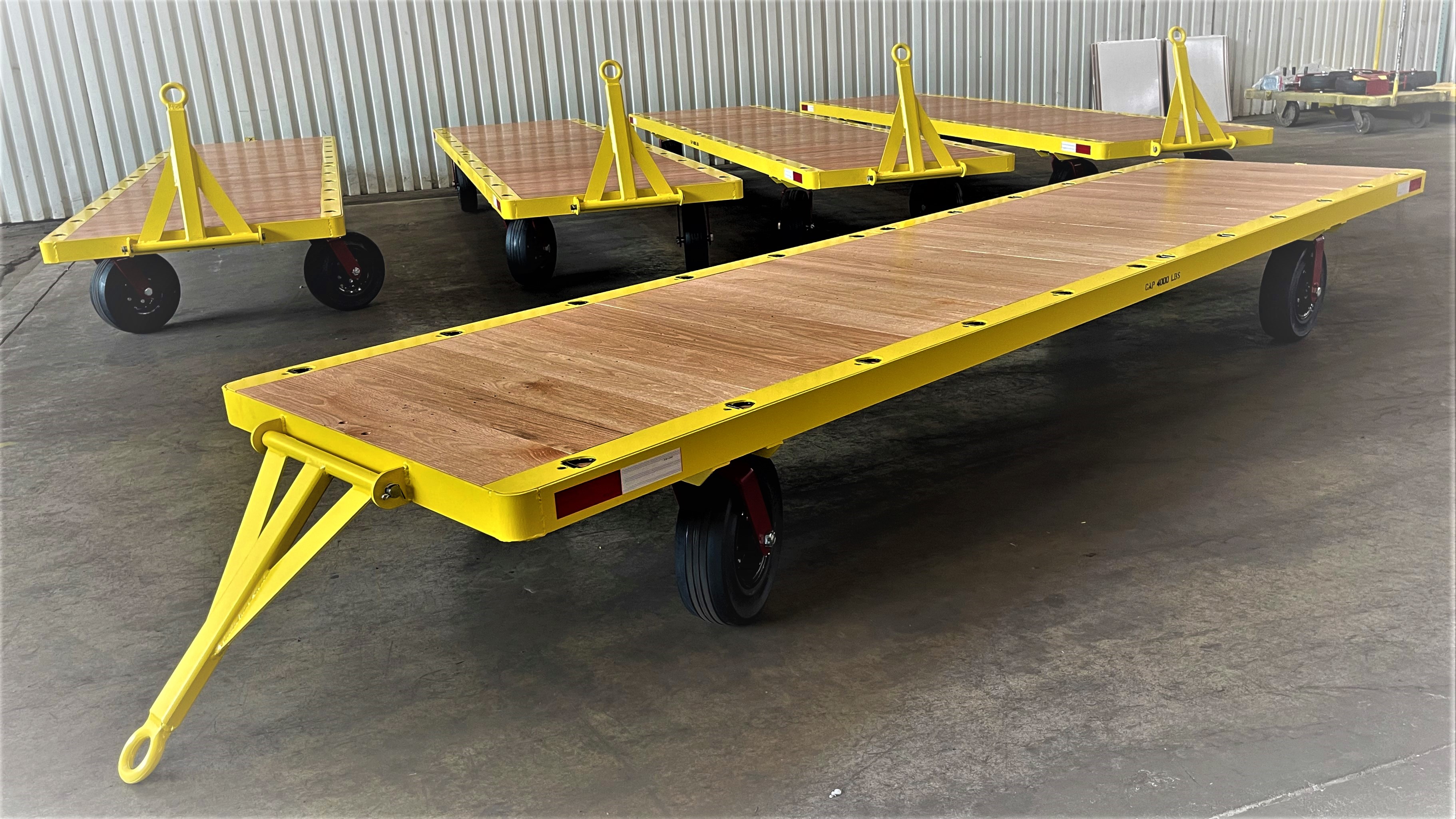 XT3347 - caster steer trailer, wood deck, lashing ring, solid pneumatic casters